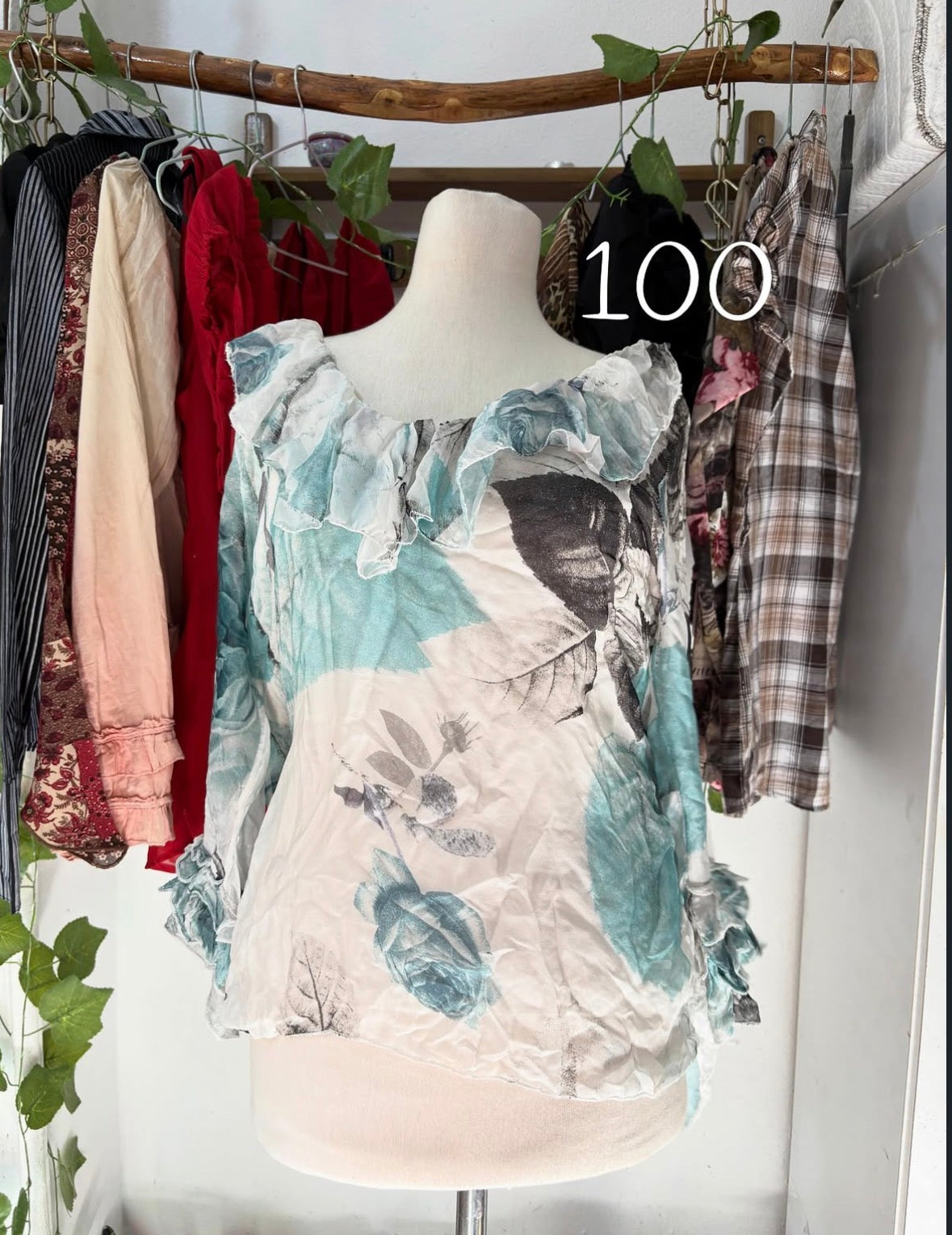 Double layered floral blue top