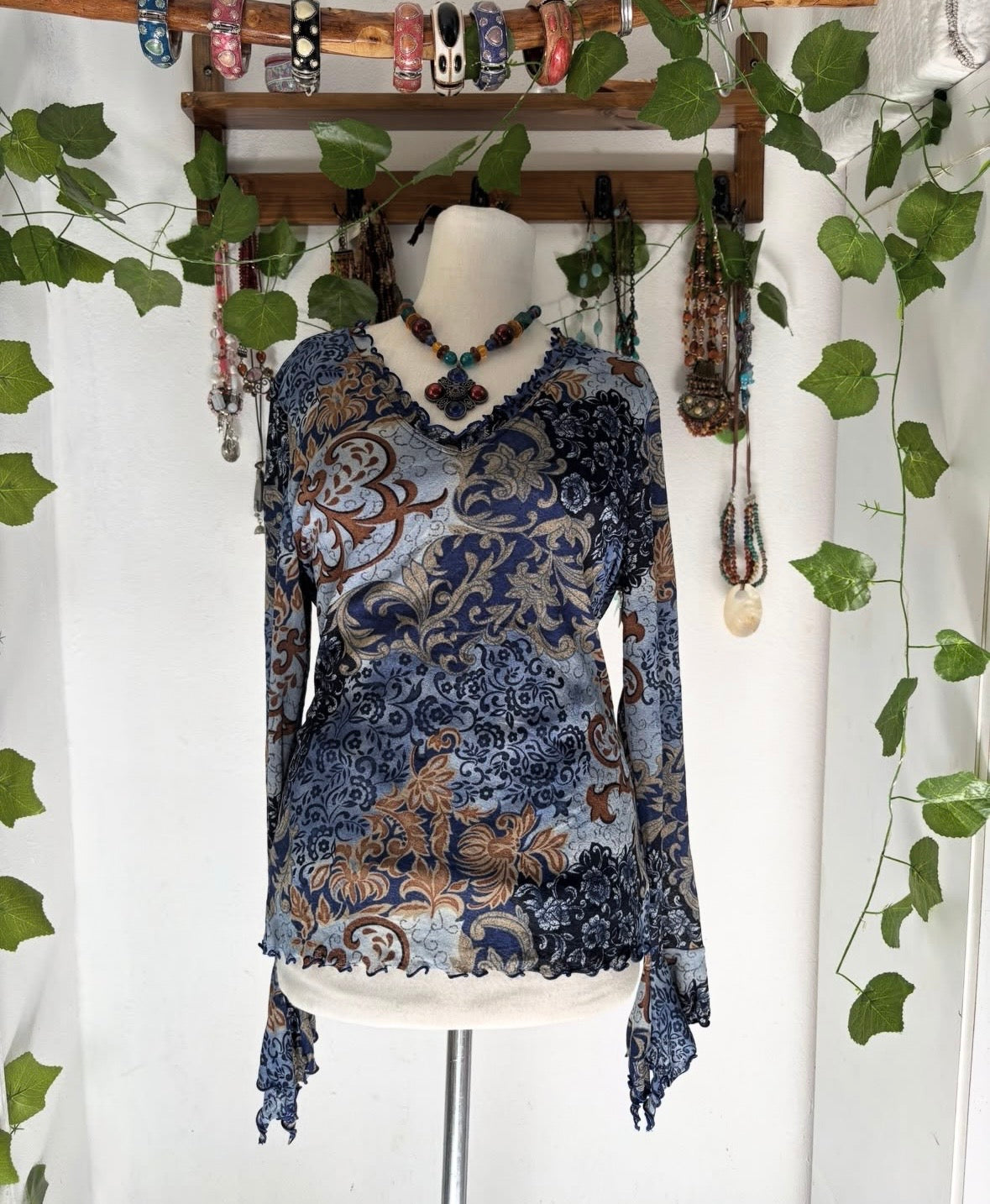 Y2k ruffled blue mesh top in printed leaves