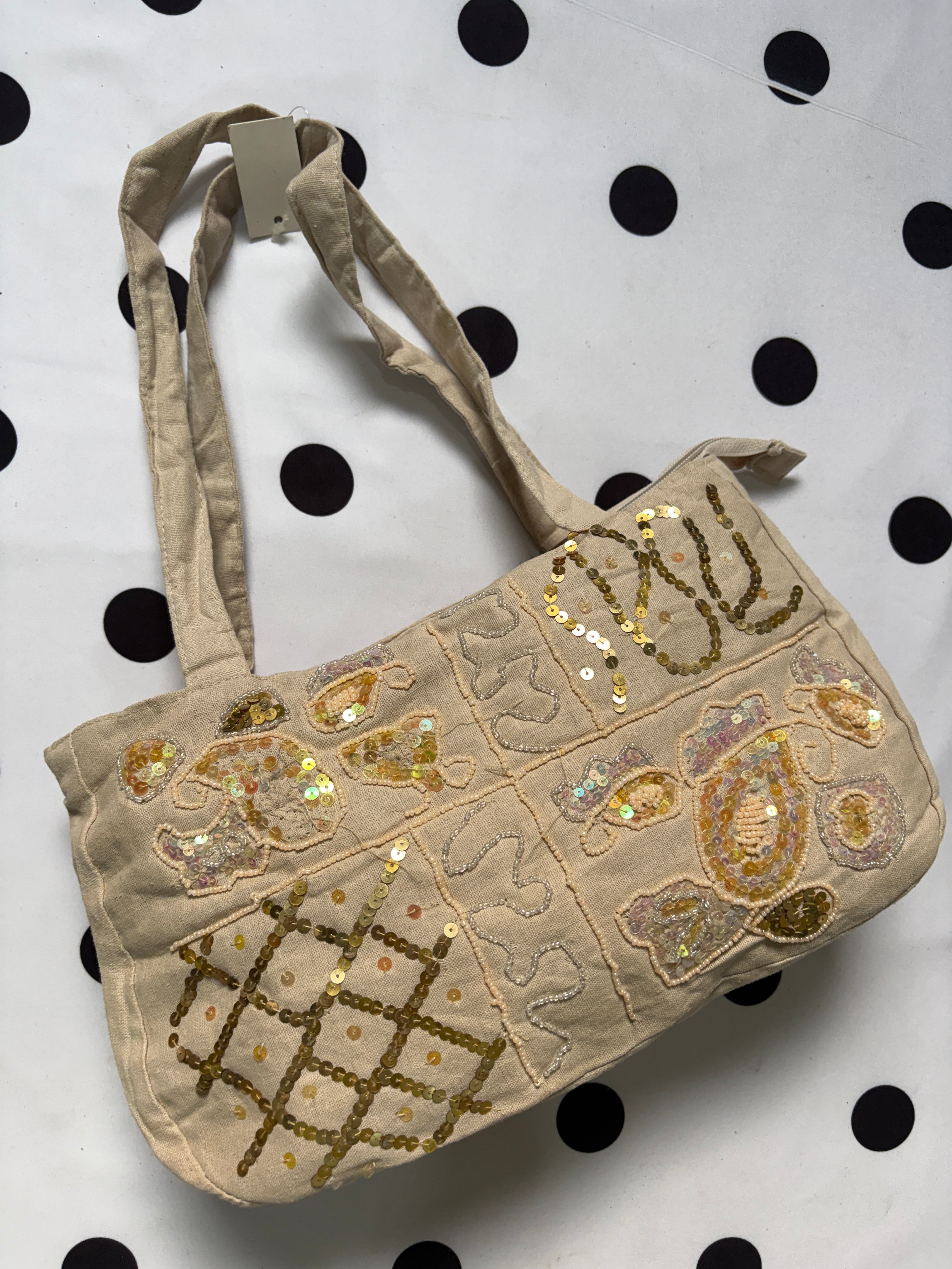 Off white beaded shoulder bag