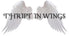 White angel wings with the text 'THRIFT IN WINGS' in black serif lettering across the center on a white background.